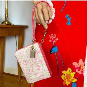 Coach Audrey Small Wristlet, in peach & khaki swirl- Used in excellent condition